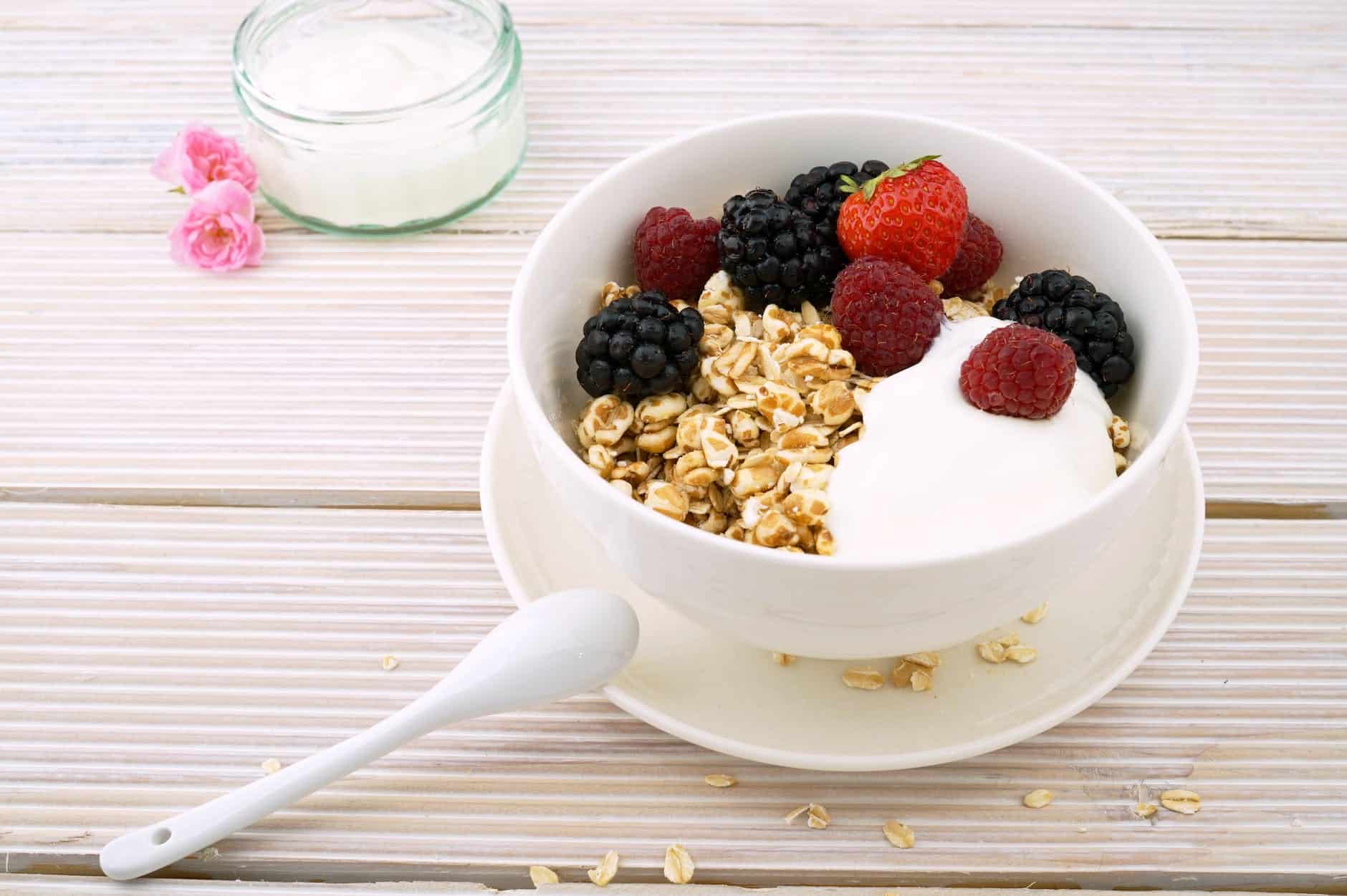 Red Strawberry And Raspberry Yogurt On White Ceramic Bowl