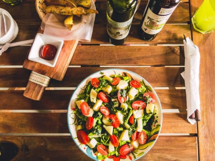 Mediterranean Diet ideas healthy vegetable salad with cherry tomatoes and mix leaves